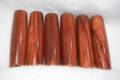 Padauk / This is an interesting wood that will develop a darker, richer patina over the years of light exposure. I have a lot of it on hand.